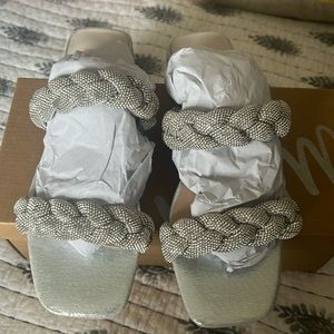 Silver Sandal. Never been worn